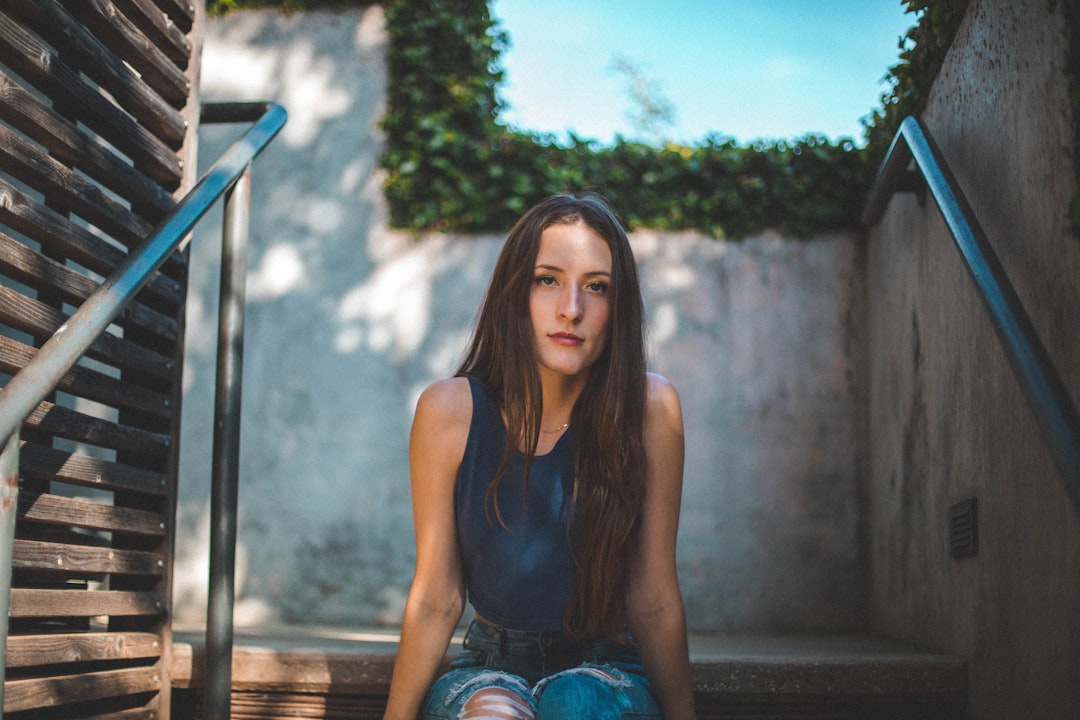 lonely teenager sitting on stairs