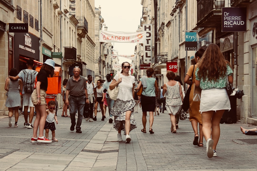 people walking urban street