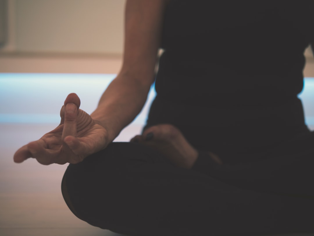 person meditating before sleep